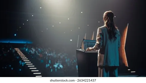 anonymous-female-speaker-talking-audience-260nw-2634221437 Lựa chọn diễn giả có chuyên môn và kinh nghiệm thực tế giúp nâng tầm giá trị buổi tọa đàm