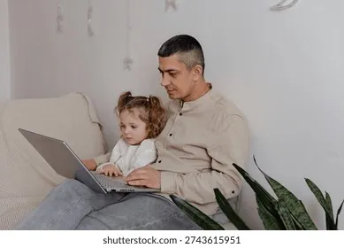 father-sits-on-sofa-his-260nw-2743615951 Lắng nghe bằng sự thấu cảm giúp thu hẹp khoảng cách giữa cha mẹ và con cái