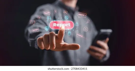 person-presses-glowing-report-button-260nw-2708433411 Sử dụng các công cụ báo cáo và chặn để đối phó văn minh với các hành vi tiêu cực trên mạng